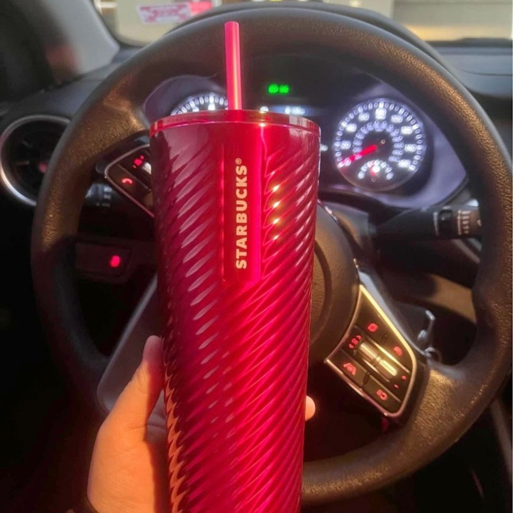 Pink swirl Starbucks holiday cup 2023